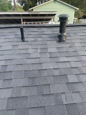 Roof vents with new metal boots and painted nlack