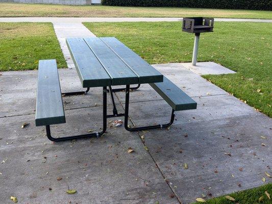 Picnic table and a grill