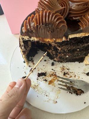 Toothpick found inside the cake slice