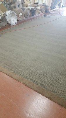 Custom area rug being made by Affiliated Carpets