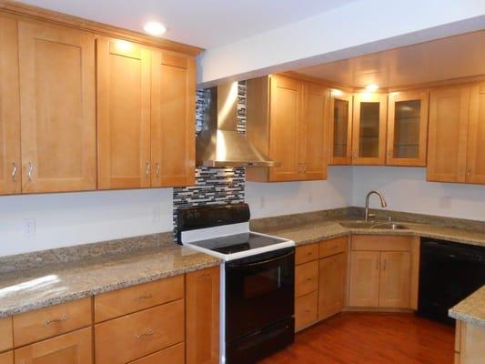 Tearing down the half-wall gave us more options when expanding the cabinets around the entire room.