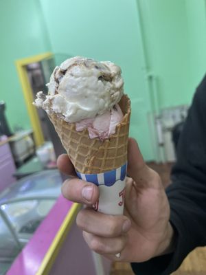 Waffle Cone with cherry vanilla and caramel pretzel swirl