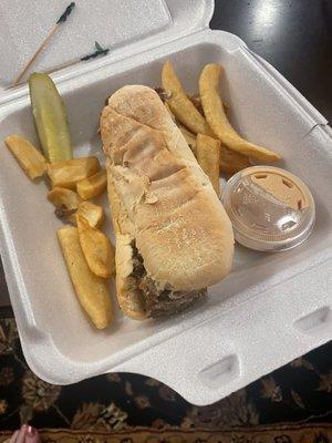 The South Philly Cheesesteak Sandwich to go. A little sloppy, but very tasty.