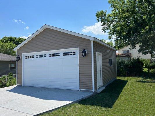 Two Cara Garage With Gable Roof.