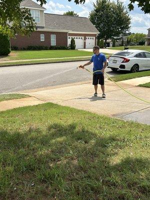 Watering down grass to prevent damage