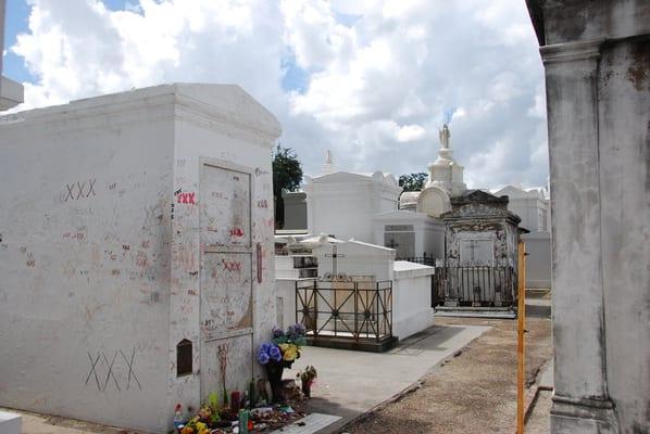 Tomb of Marie Laveau -Voodoo Queen of New Orleans. I bring tours here ,perform weddings here and it is  #1 visited spot