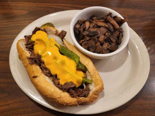 Philly cheesesteak with buttered mushrooms