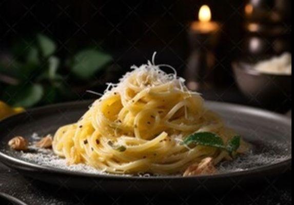 Pasta Al Limone,
Spaghetti pasta, fresh lemons, pecorino cheese, butter, and grated parmesan.