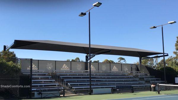 Stadium bleachers shade structure at University of California Irvine Anteater tennis courts