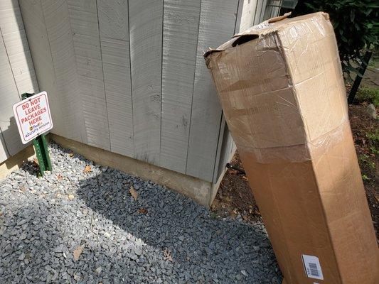 Today's 200lb delivery, leaning on my house, right next to the DO NOT LEAVE PACKAGES HERE sign.