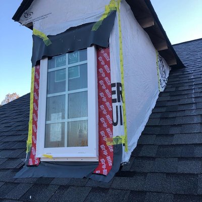 Siding dormer before/after