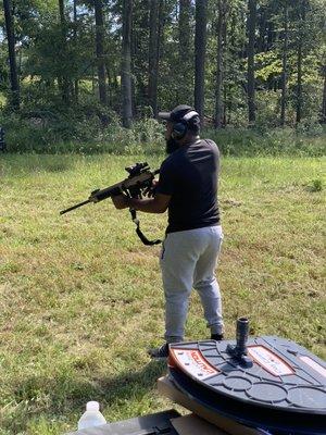 In the series of pictures of this young is shooting an AR 15 for the first time 
He is shooting a HK MR555A1