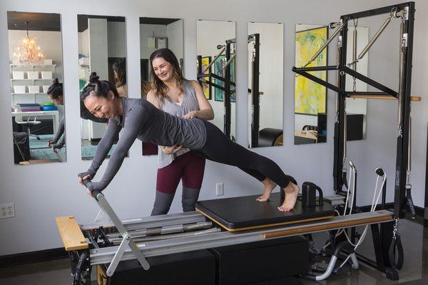 Plank on the Reformer will have your abs and arms burning! The extra challenging exercise is for those who have truly mastered their core.