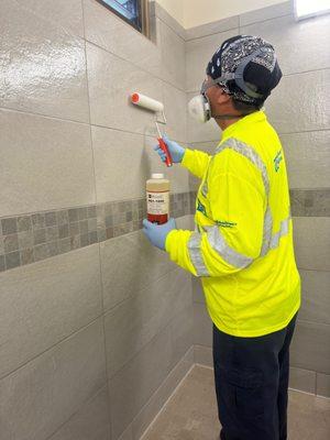 Coating tile, stone and grout with sealer to prevent mold and mildew. Good for 3+ years. No need to wax