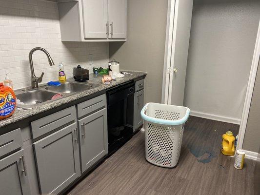 The kitchen facing the laundry room 7.30  (we just moved in)