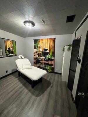 Massage Therapy Room with private changing Room