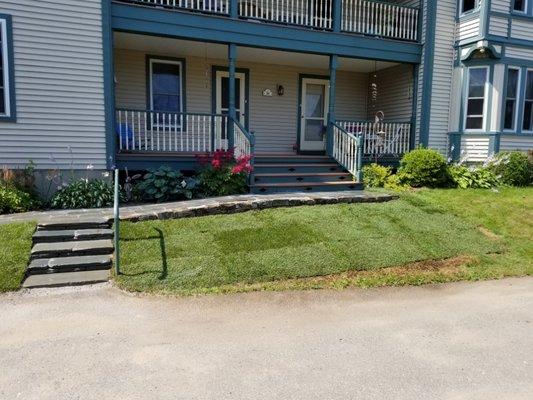 Stone walkway, sod