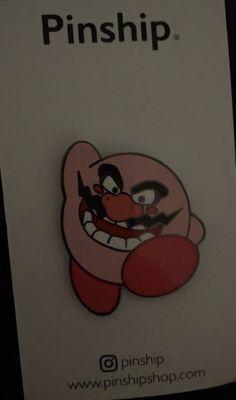 This is the lovely Wario Kirby pin I bought- It is very unique, and I love it.