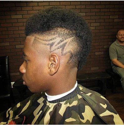 Faded mohawk with design