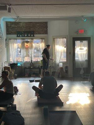 The instructor safely setting up candles and incense.