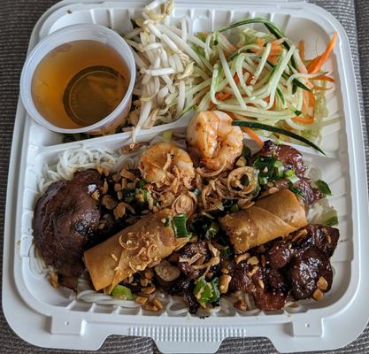 Grilled pork and shrimp on vermicelli