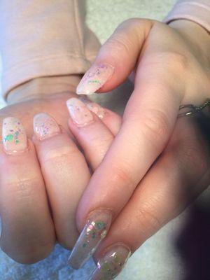 We do dipping, ombre, marble,  and galaxy designing on nails. 50% off of first visit.