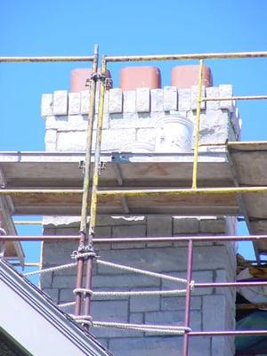 Stone chimney rebuilt in Kansas City, Missouri