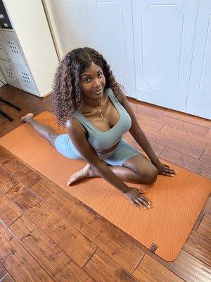 Teairra teaching yoga at my home.