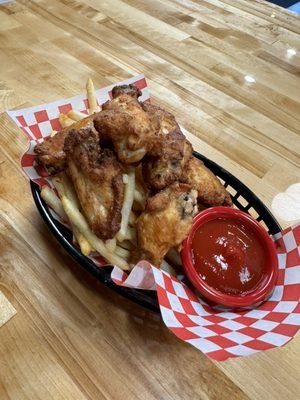 Bone In Chicken Basket with Fries and Ketchup offered on the concessions menu