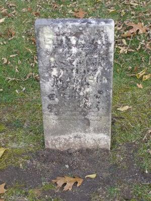 Personal pic- the years and weather have ravaged this headstone, making it unreadable.