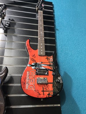 Walking Dead autographed guitar.