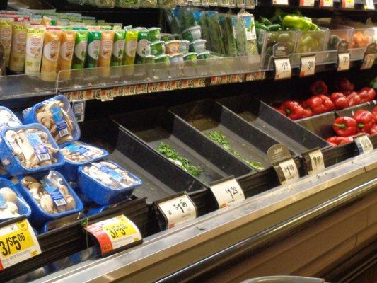 If you shop here...you understand why I took these photos.  The other produce?  On the verge, if not already decomposing.