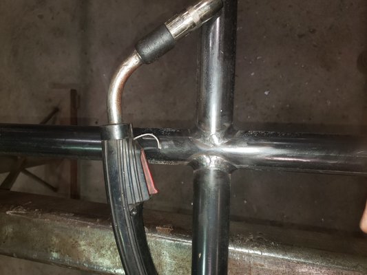 Practice makes perfect! A clean weld on a steel handrail.