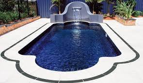 Add sleek lines and a waterfall for a pool that will really stand out.