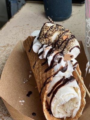 Fluffy fingers Ice Cream Taco- Hand Rolled ice cream, Toasted Marshmallow Butterfingers, chocolate sauce.