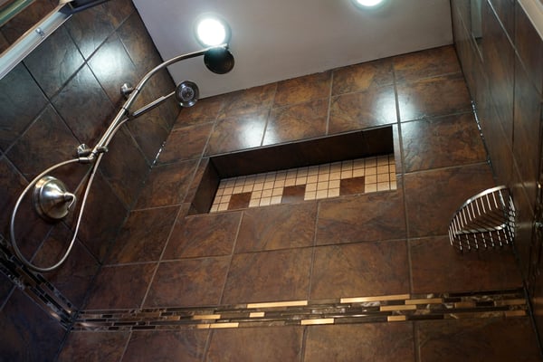 Shower tile in a bathroom remodel.