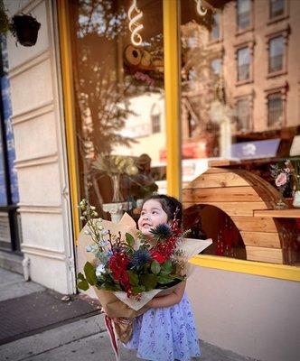 Juliette helping at the store.