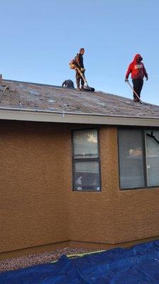 Removing three tab shingles!