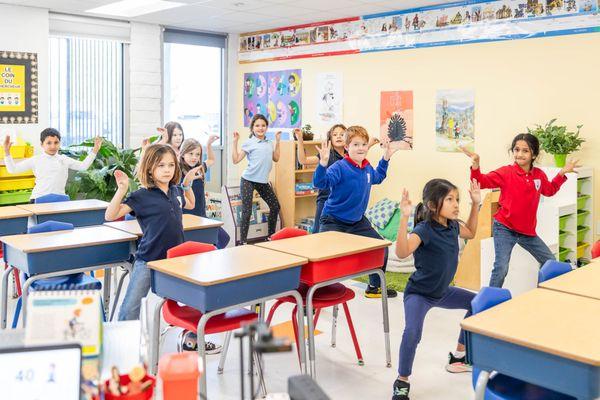 Yoga poses during maths lessons for our 3rd Graders