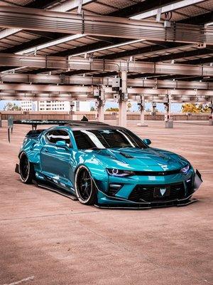 Fully Custom Aerodynamic Kit on this Widebody Camaro made in house and installed by us.