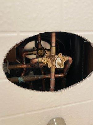 Double shower valve back to back installation.