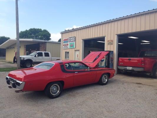 Front of the shop with one of our great customer's Road Runner