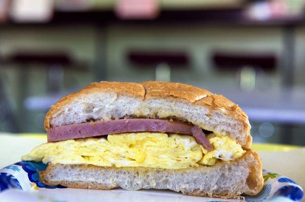 Spam and Egg Sandwich: Off-menu; $3.81 including tax. On a slightly-buttered roll. Half shown. Good sandwich, satisfyingly large.