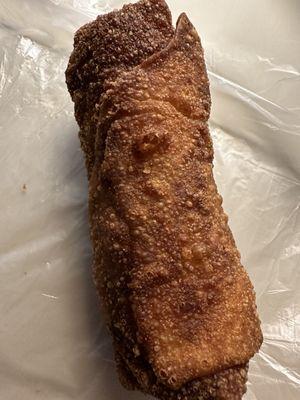 Look at this burned up "Shrimp Egg Roll".  It was supposed to be shrimp, the inside looked like shredded beef. Garbage!