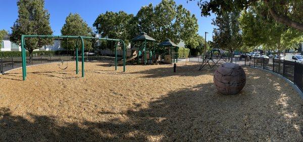 Kids play area. Basketball court next to it.