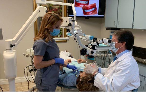 Lead Dental Assistant and Patient Coordinator Niury and Dr Belaunzaran at work