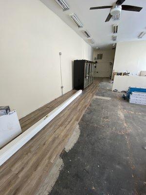 The start of a luxury vinyl planking install for a floral shop down in San Rafael, CA.