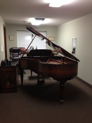 One of our piano rooms, housing a grand piano.