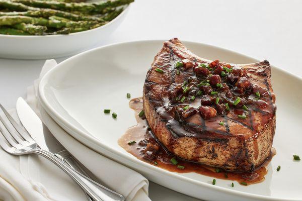 Bone-In Pork Chop:
Grilled and topped with bacon apple jam.