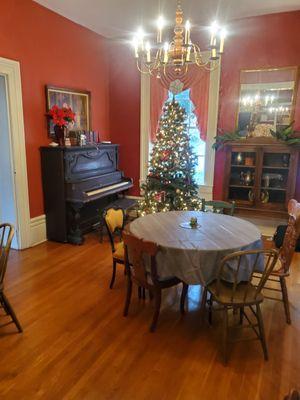 Front parlor, piano playing, meeting room